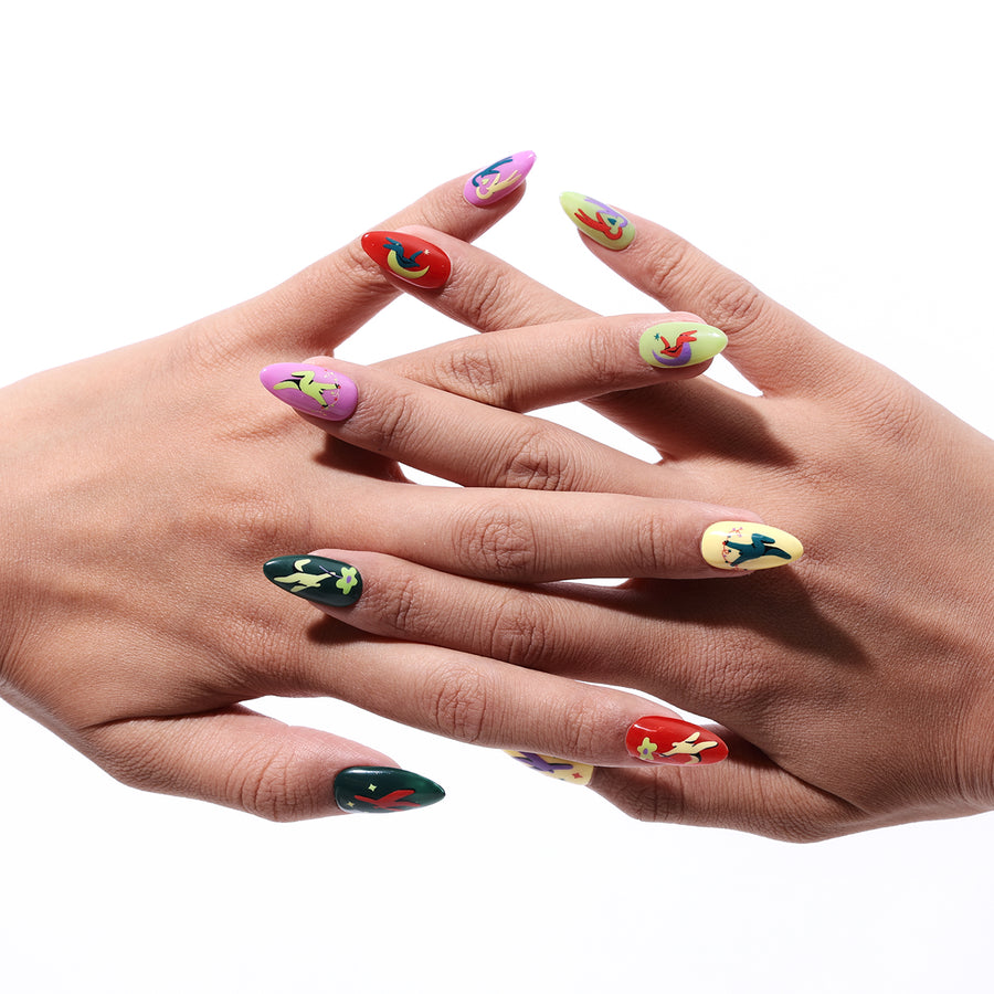 Dream Solo press-on nails with playful Jocelyn Tsaih art in assorted colors and designs.