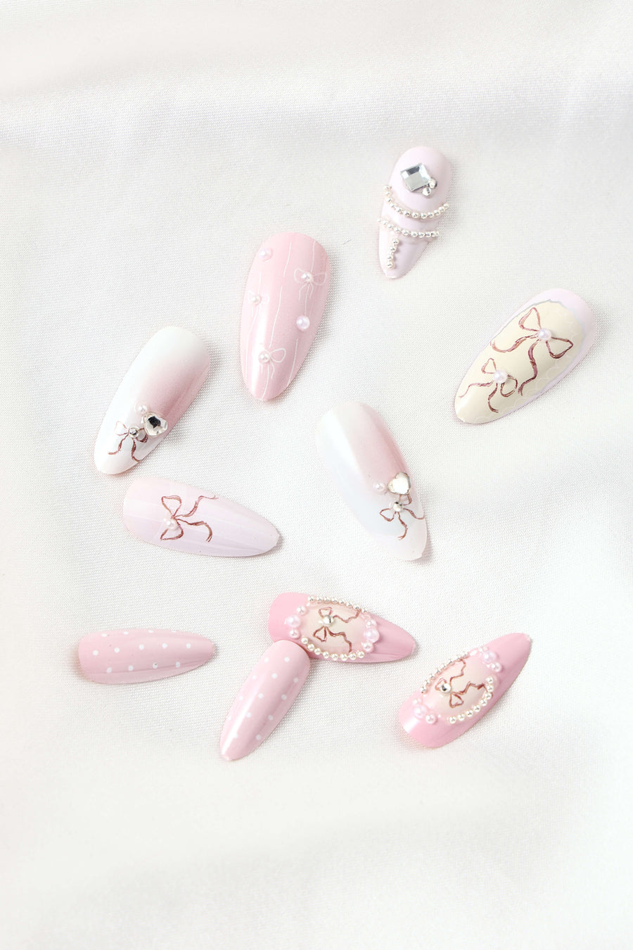 PAINTED BOWS  - ALMOND PRESS-ON NAILS 